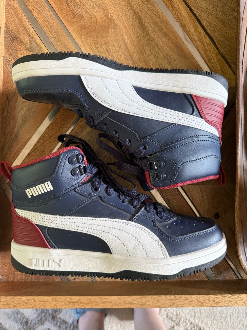 Puma boys High-Top Athletic Sneakers in Navy/White with Red Accents size 7
